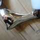 Pair of stainless steel and opaline wall lamps
