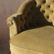 Paire de fauteuils crapauds et leur pouf vert