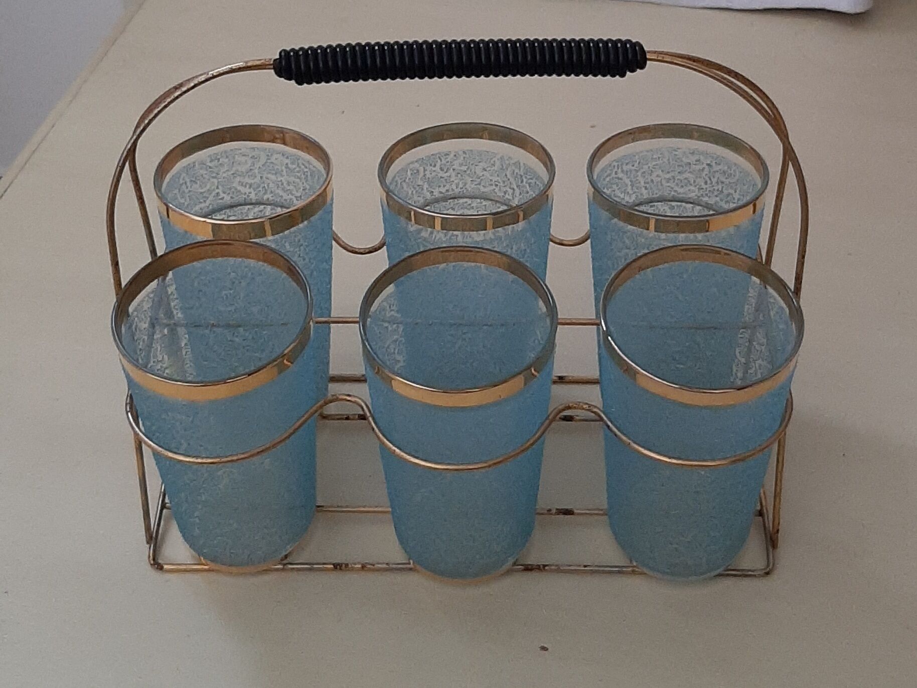 Support and glass for orangeade