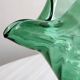 Green blown glass pitcher, unique twisted design