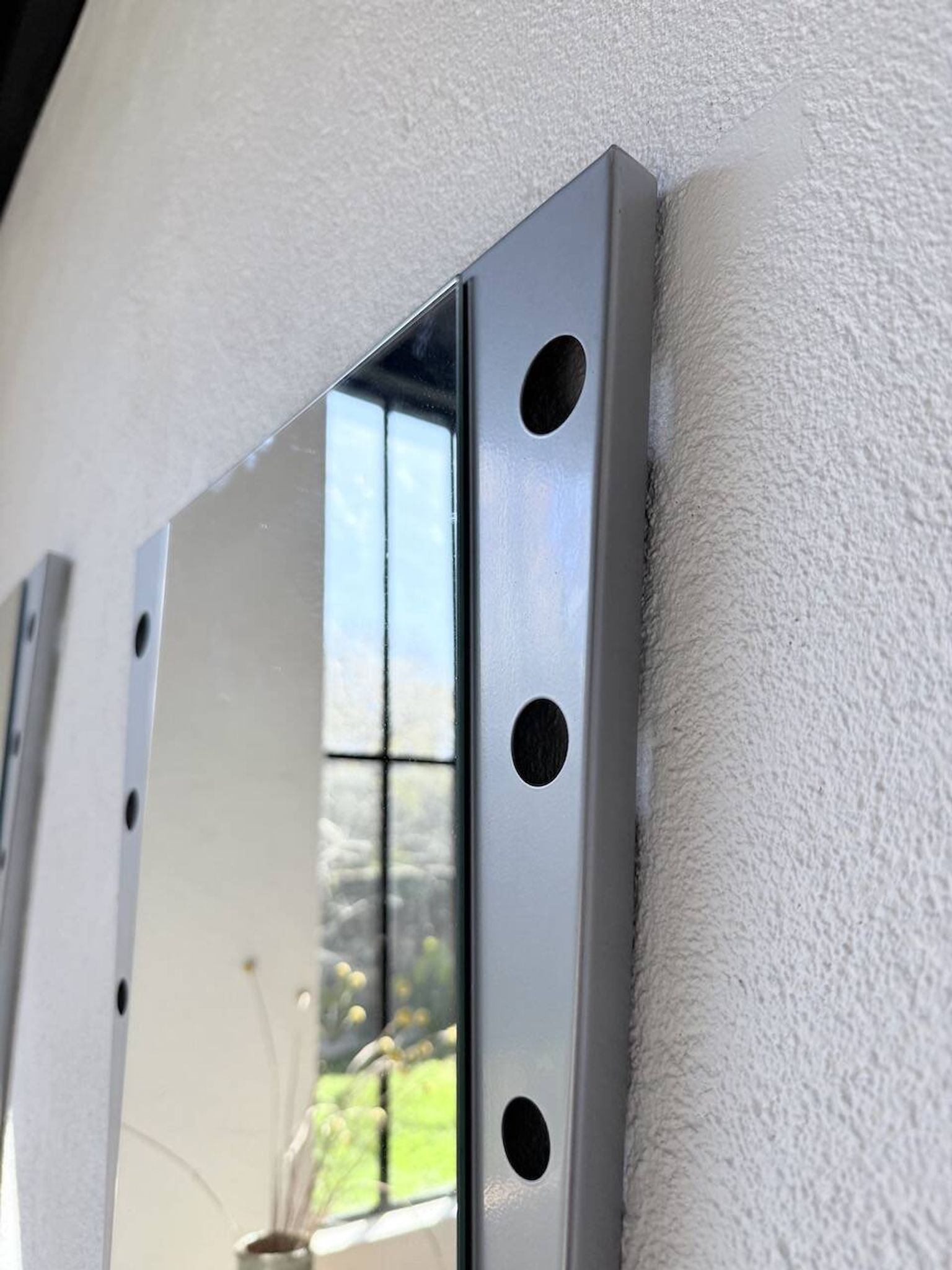 Pair of "Memphis" mirrors from the 80s in chrome and wood.
