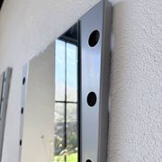 Pair of "Memphis" mirrors from the 80s in chrome and wood.