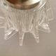 A set of smaller hanging lamps, in hard pressed glass, with metal top
