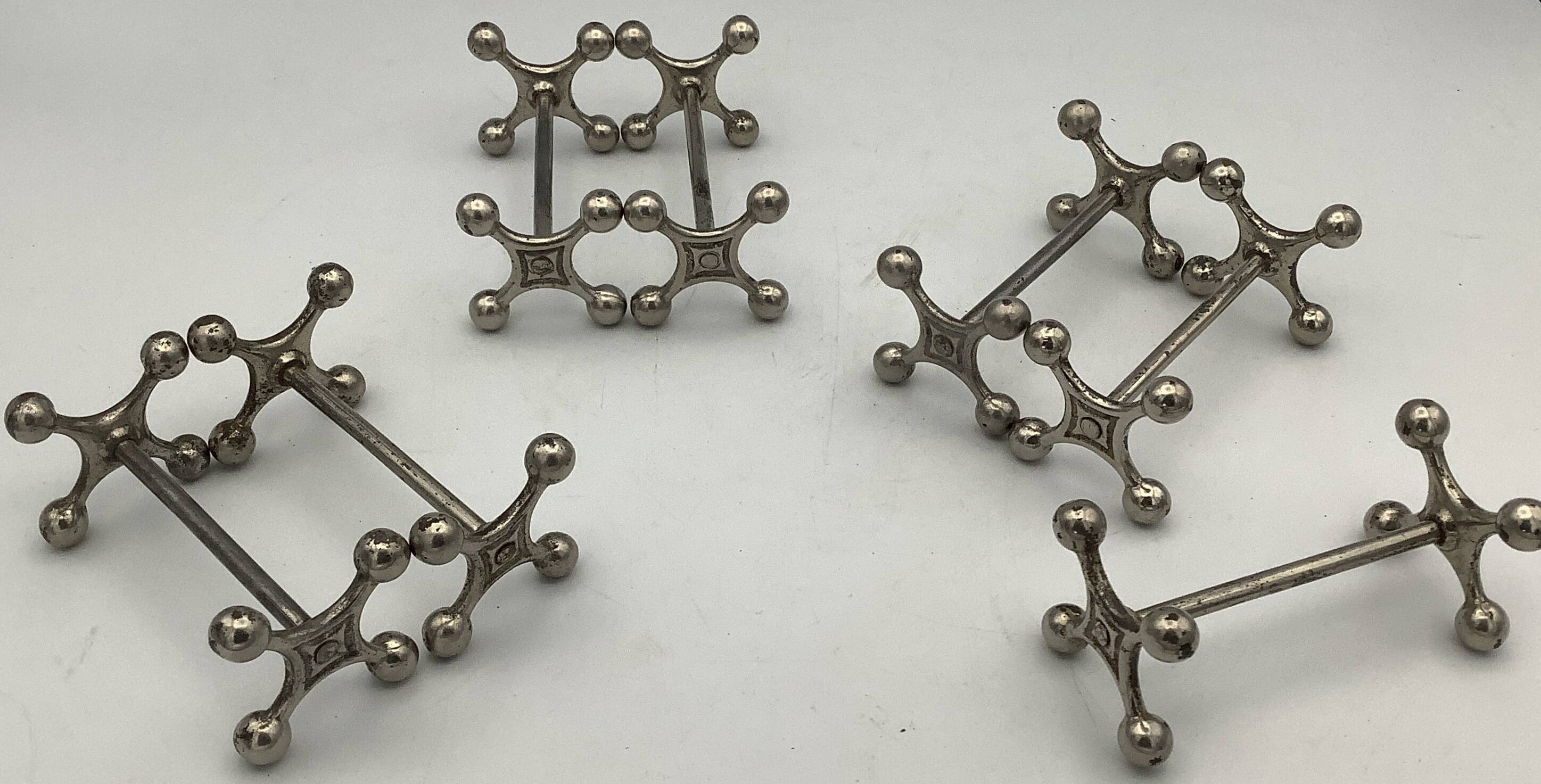 Set of 7 vintage knife rests in the shape of crosses in silver-plated metal.