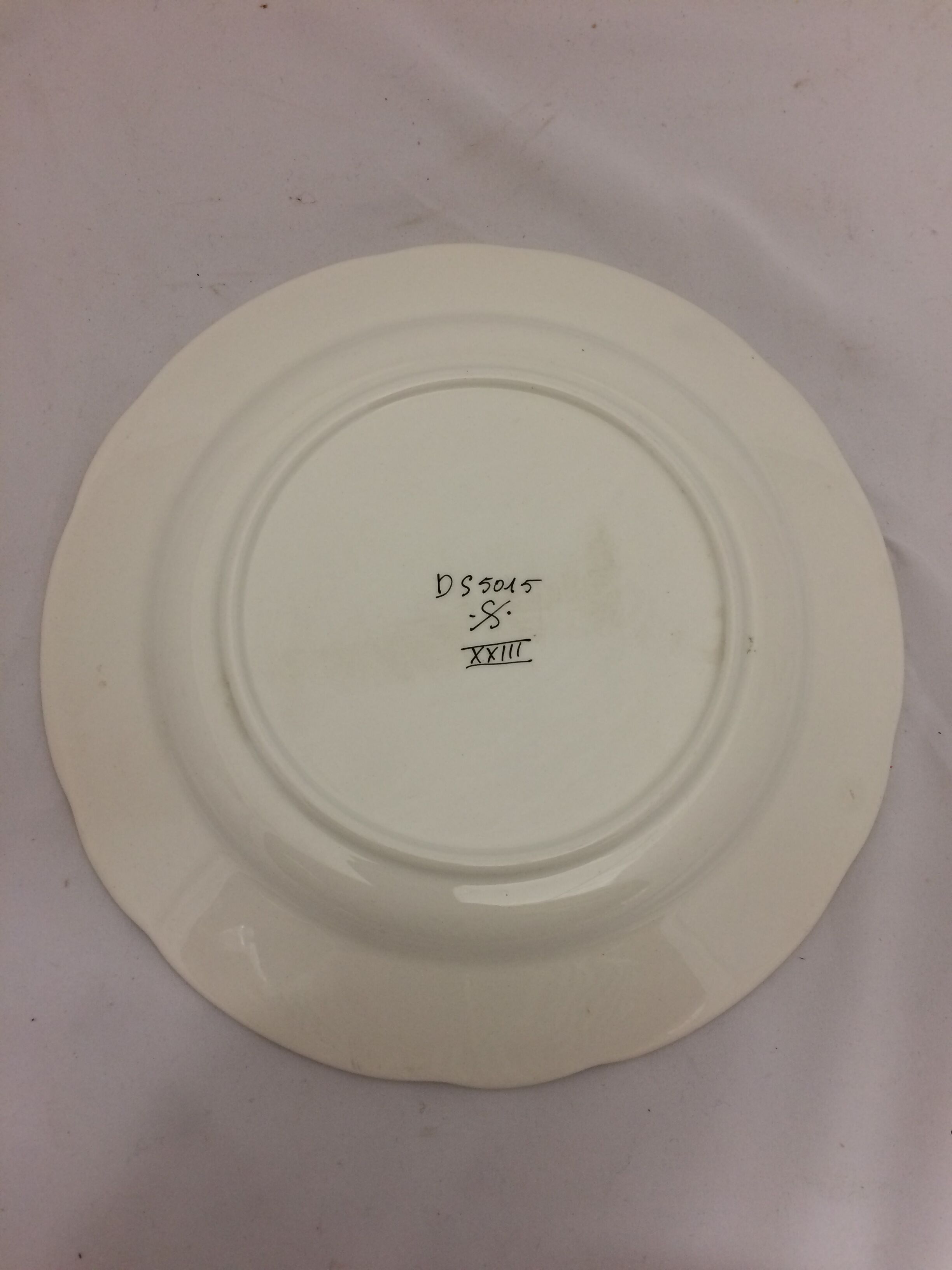 Old porcelain rooster plate