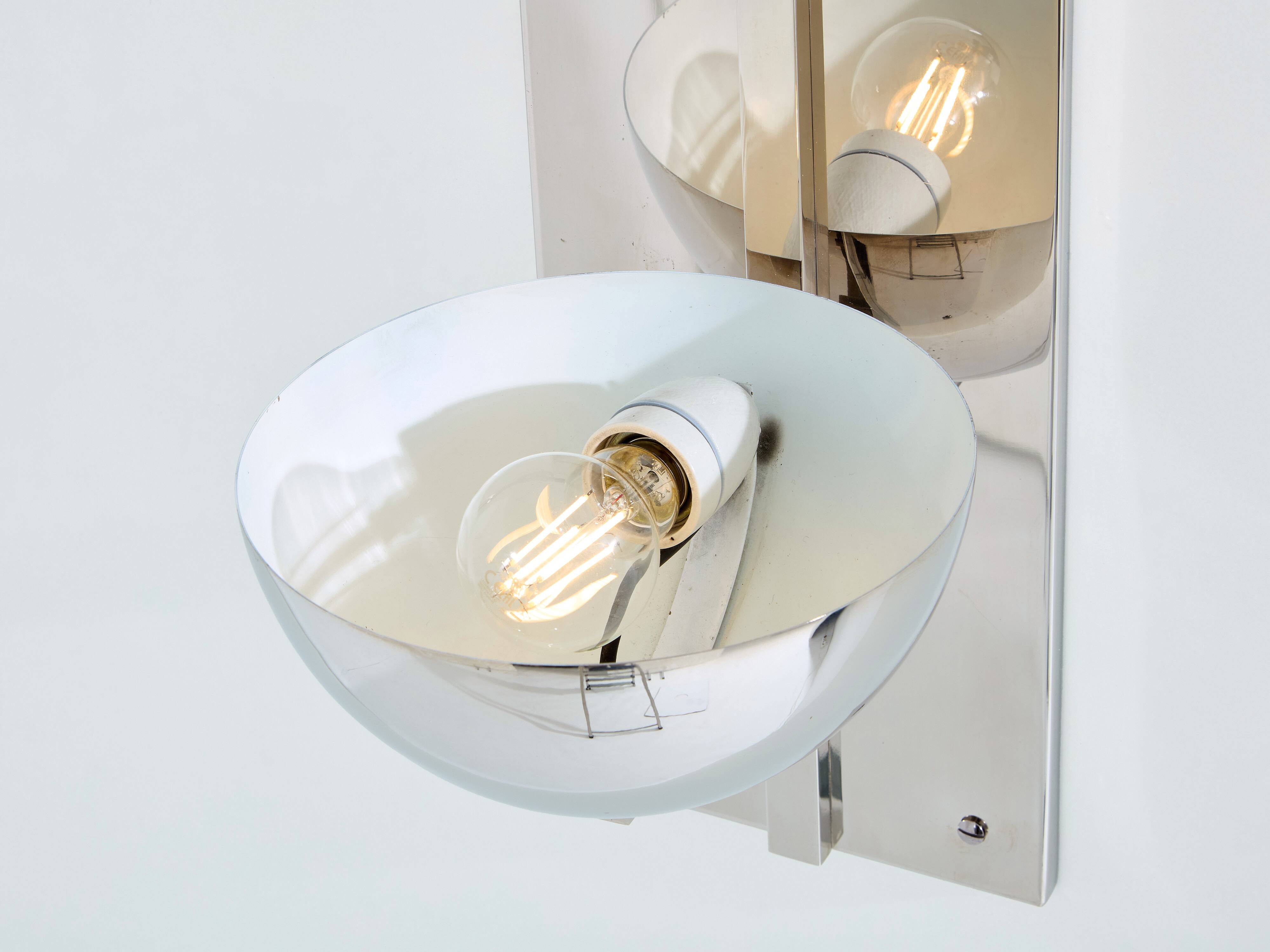 Pair of modernist wall lights by Claude Parent, nickel-plated steel, 1992.