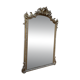 Miroir Napoléon III en bois et stuc doré
