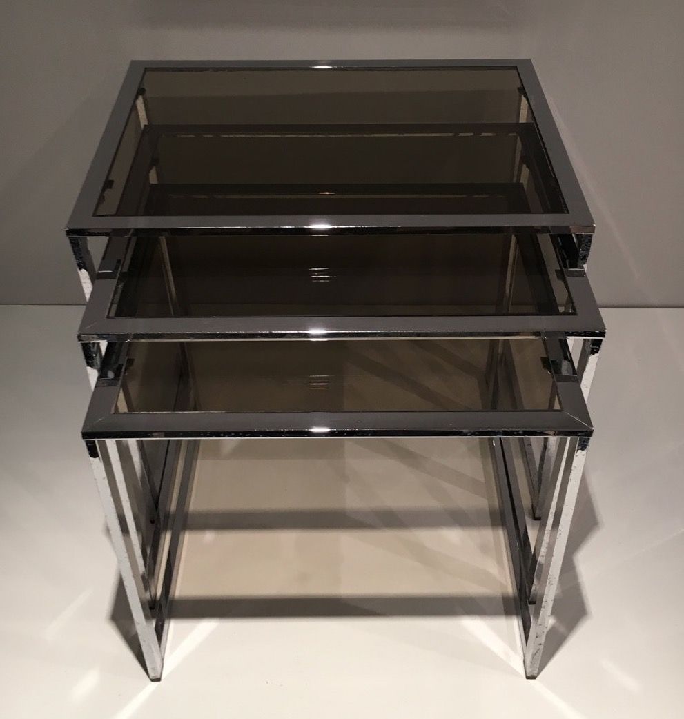 Set of 3 chrome nesting tables. Around 1970.