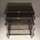Suite de 3 tables gigognes chromées. Vers 1970