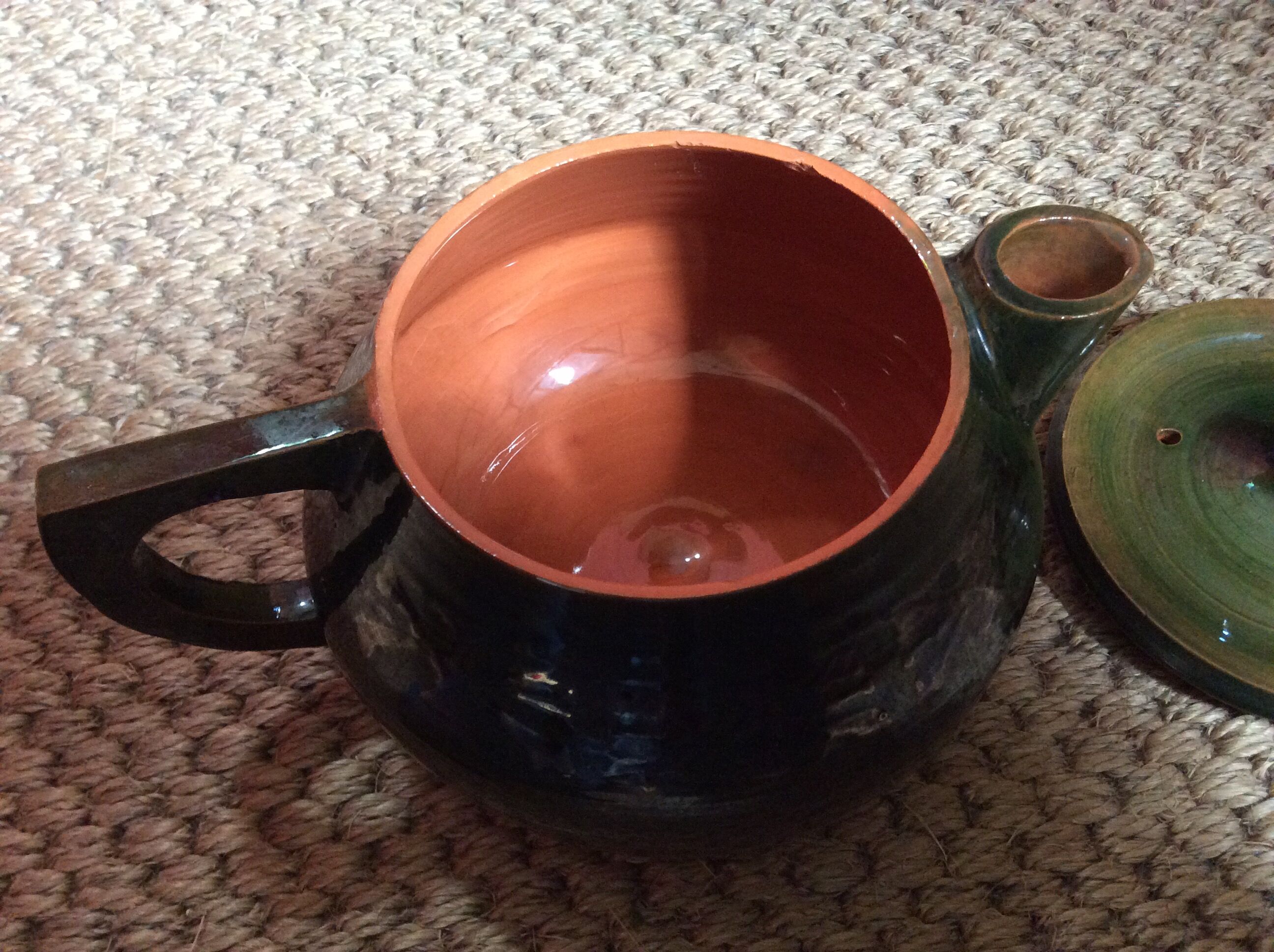 Glazed terracotta teapot
