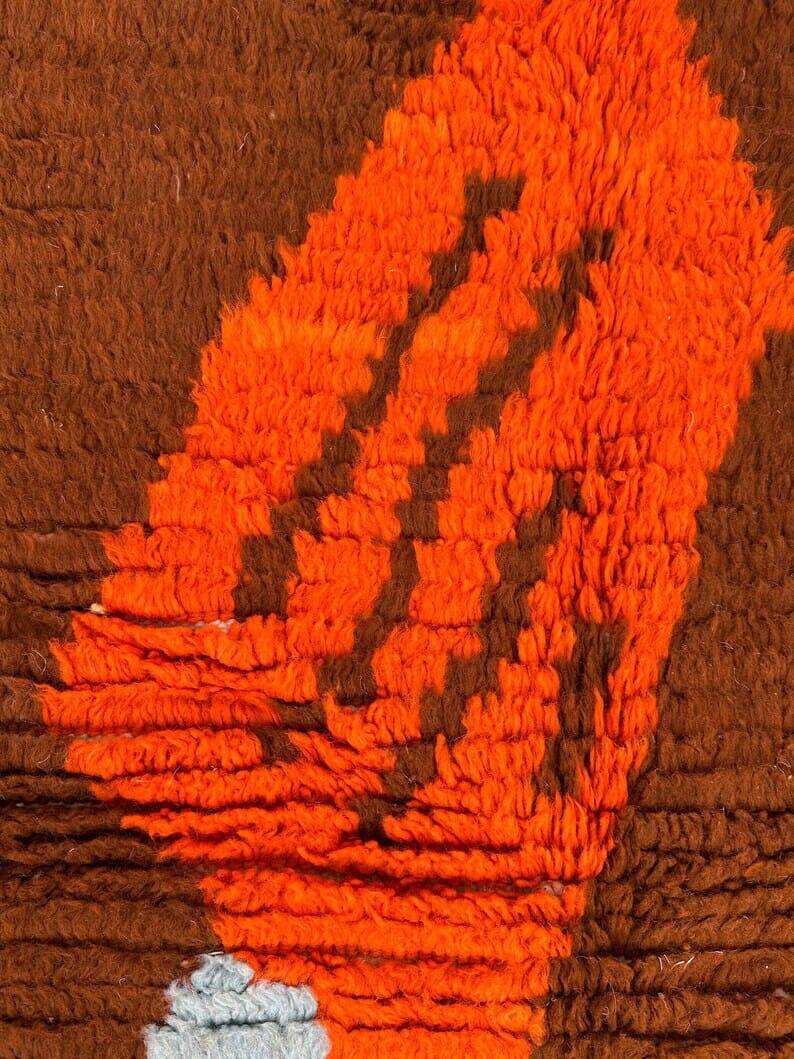 Moroccan wool rug with traditional colourful patterns, size 140 x 260 cm.