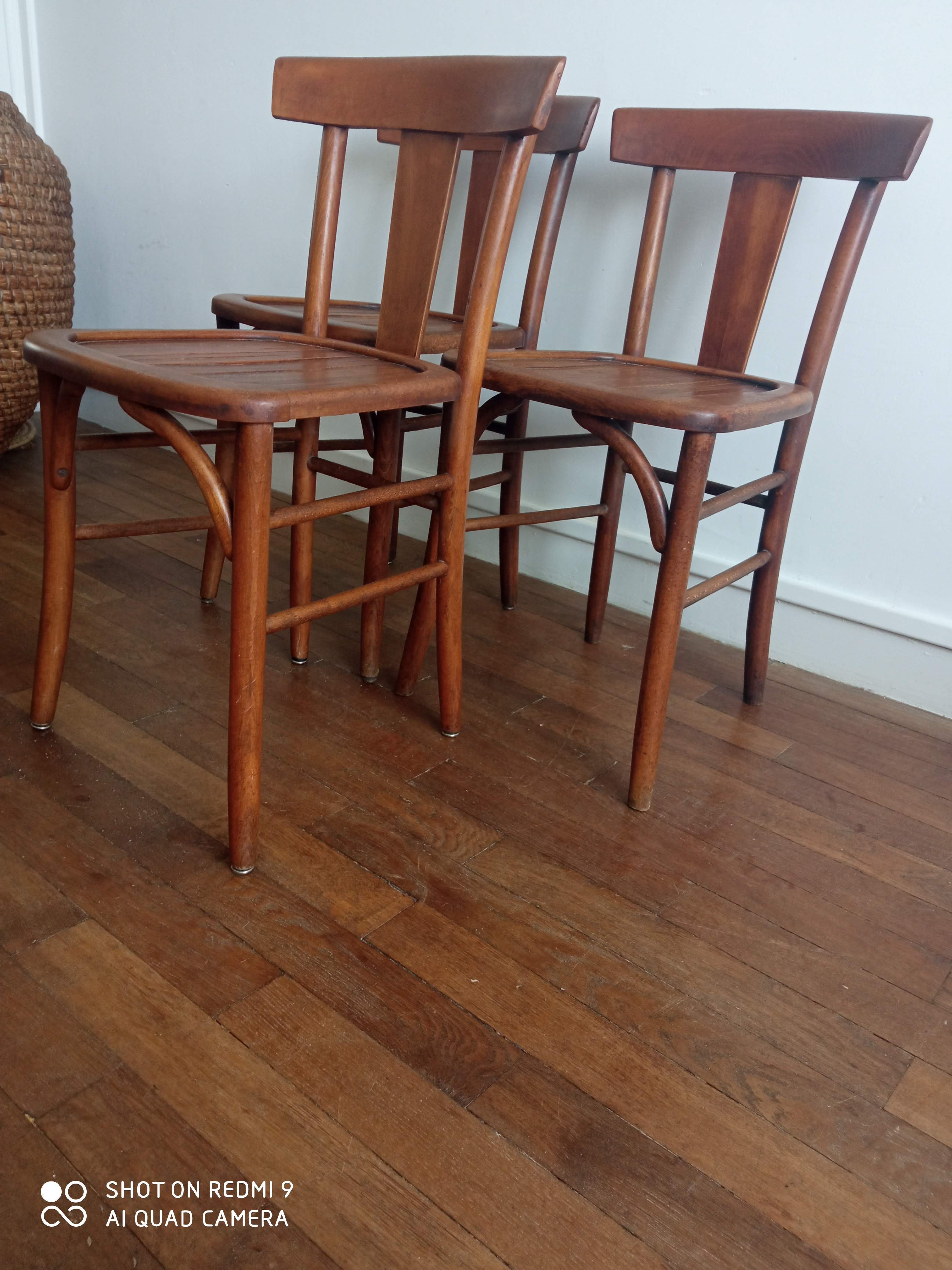 Trio of old bistro chairs