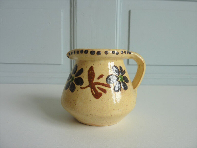 Ancient ceramic milk pot