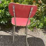 Formica table with a red Mid-century chair.