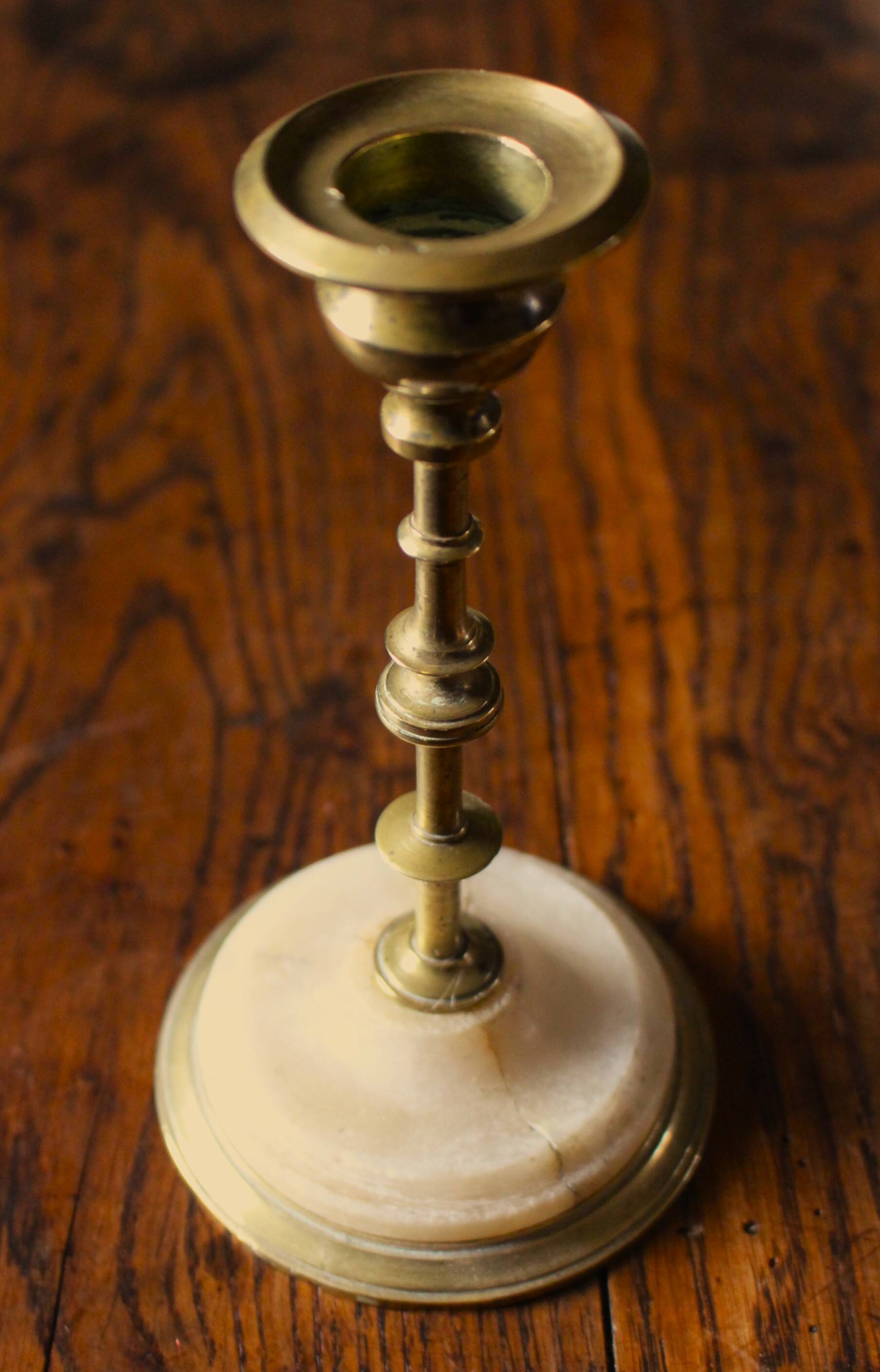 Fine brass candle holder alabaster base