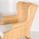 Paire de fauteuils club en rotin