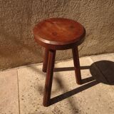Brutalist tripod stool from the 50s in wood.