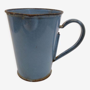 Old blue enamelled pitcher with spout