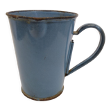 Old blue enamelled pitcher with spout