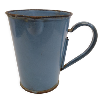 Old blue enamelled pitcher with spout