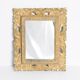 Decorative gold mirror mid-century in a wooden frame, Italy, 1960s.