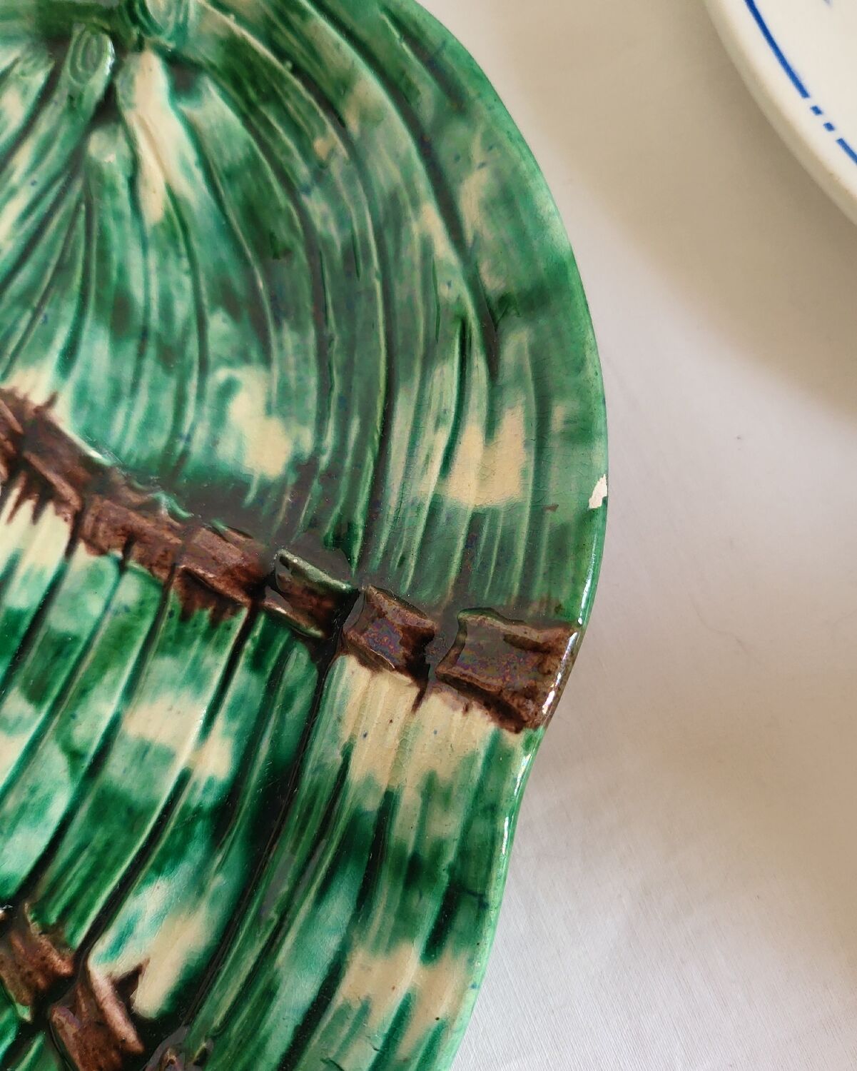 Dish and Asparagus Drainer in Green Barbotine Earthenware