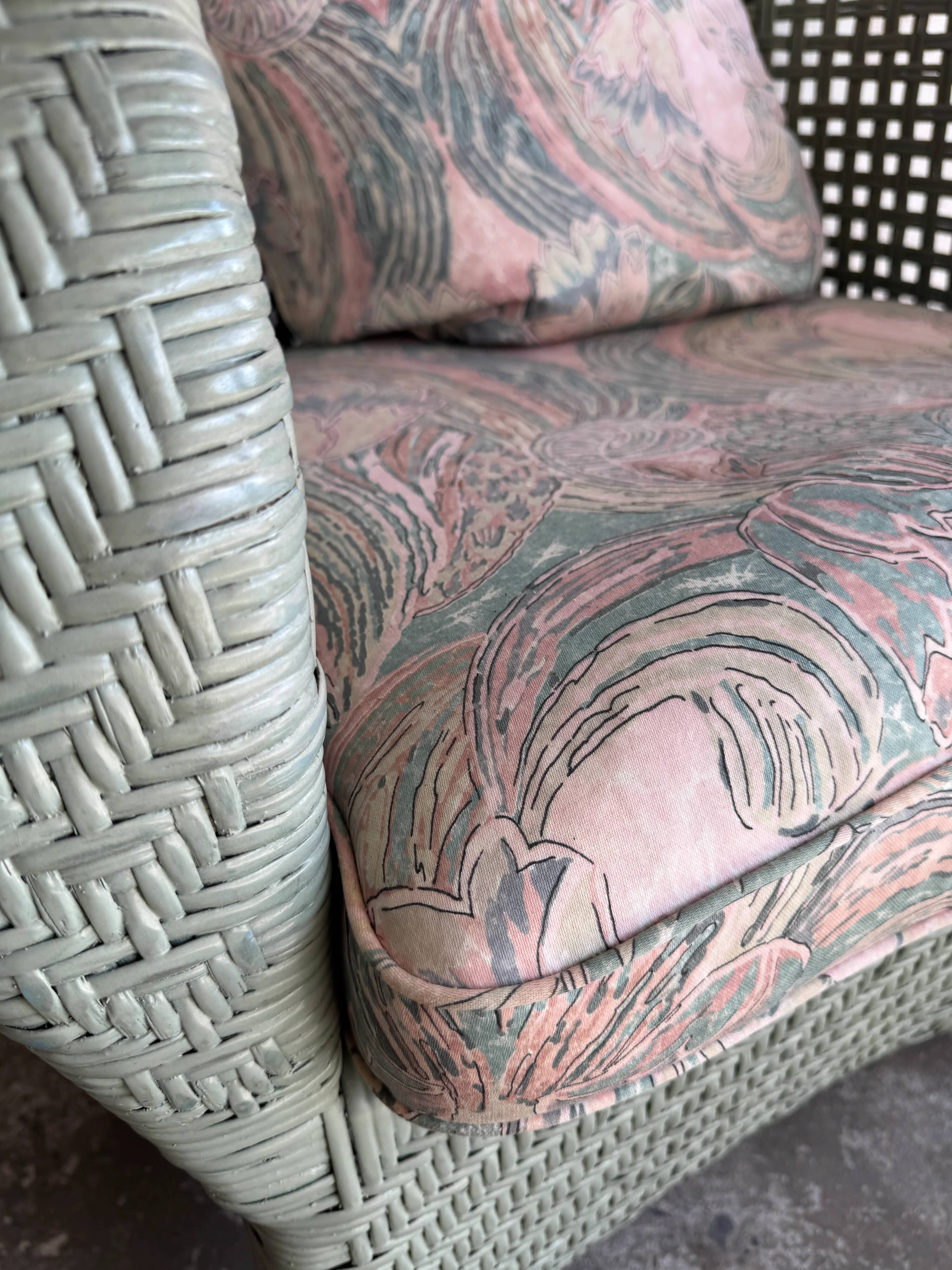 Vintage wicker lounge chair with pastel cushions – 1980s