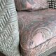 Vintage wicker lounge chair with pastel cushions – 1980s