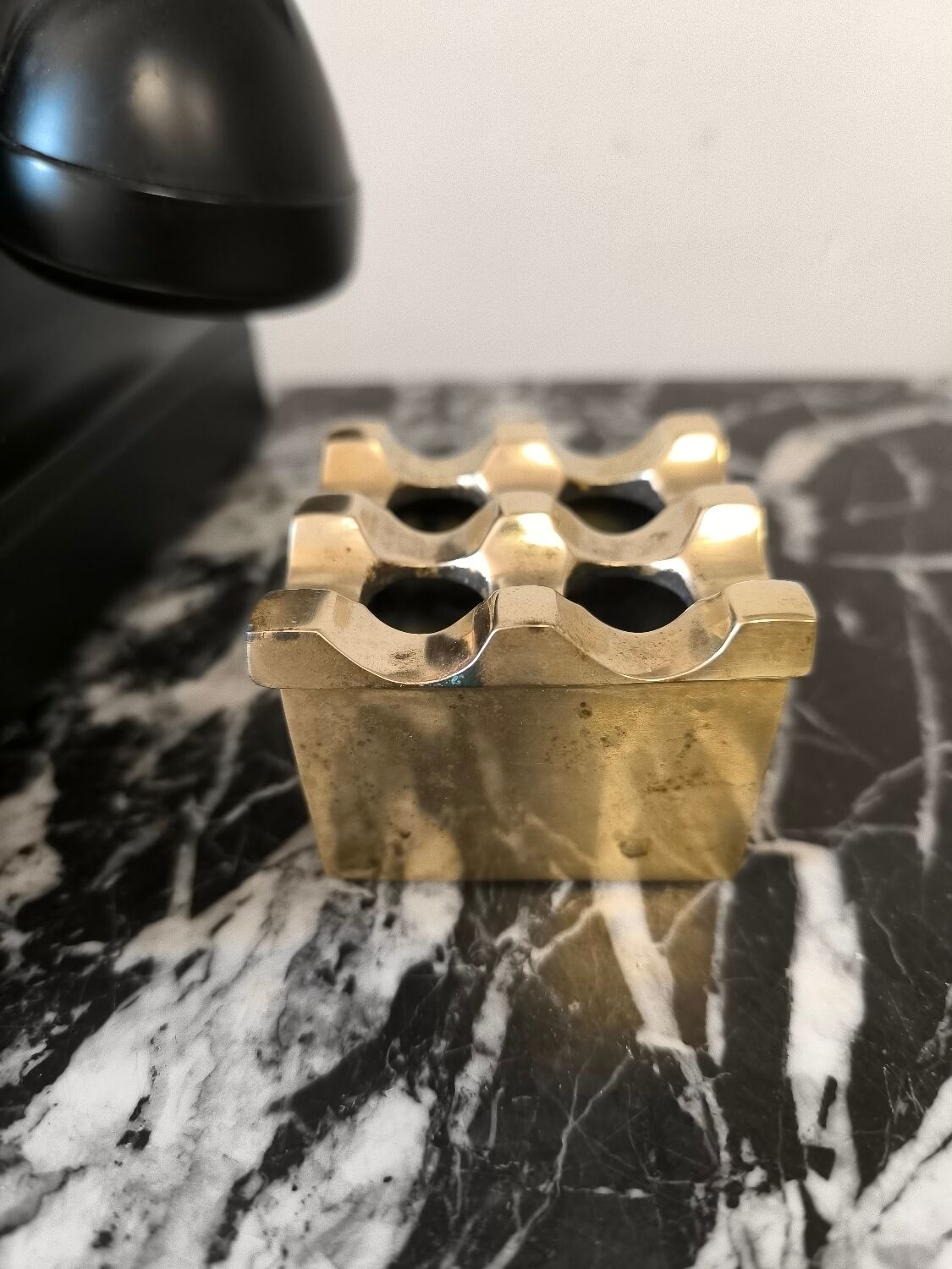 Ultima ashtray in gold-plated brass designed by Holger Bäckström & Bo Ljungberg.