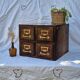 Workshop furniture made of oak and brass.