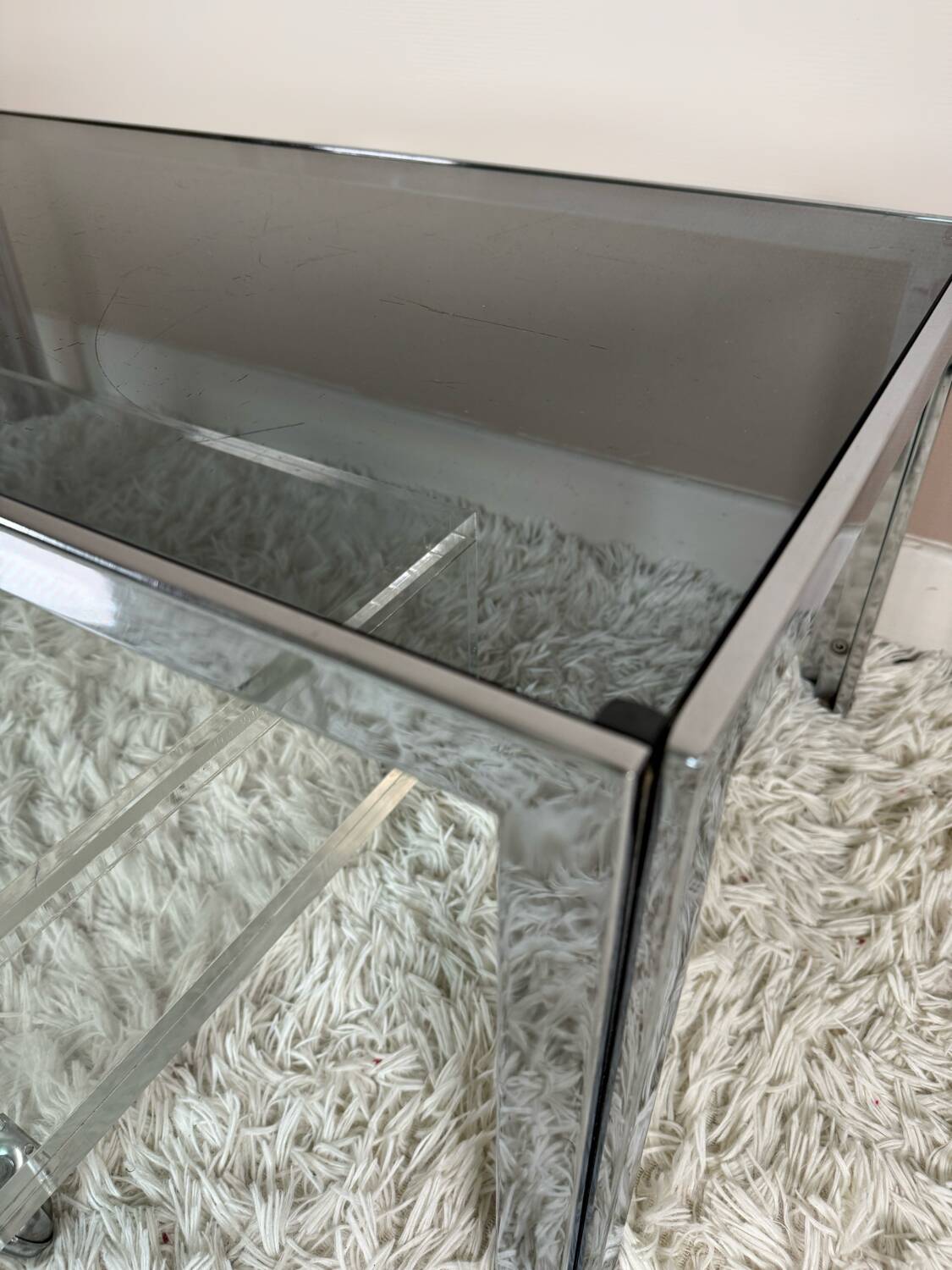 Table basse chromée et verre fumé années 70
