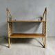 Wall shelf in wood and rattan from the 70s