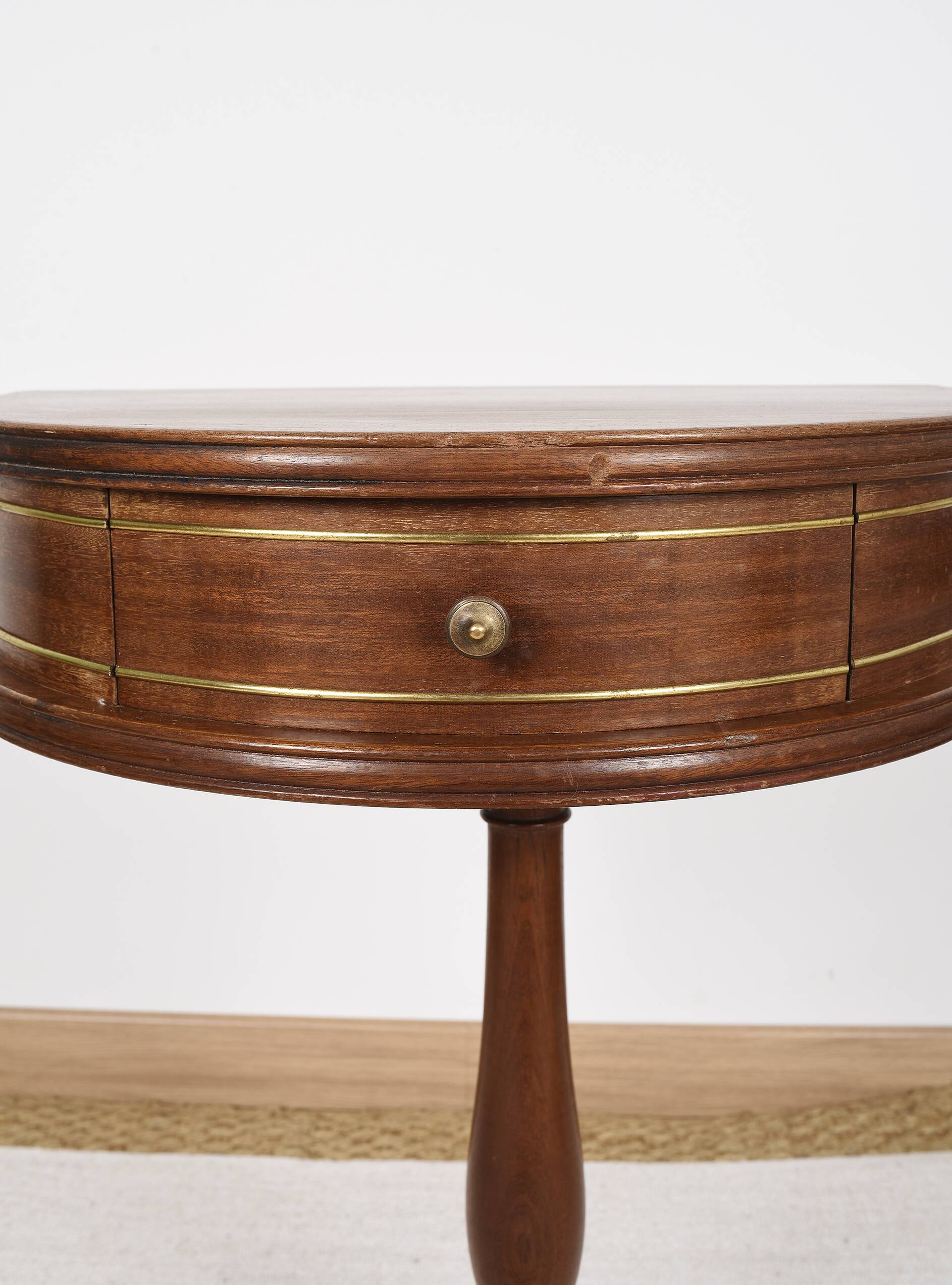 Pedestal table or small side table with drawer.