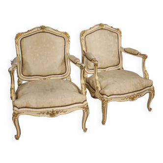 Painted and gilded armchairs in Louis XV style from the 20th century