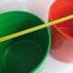 Pair of vintage paper baskets "Crayonne" in ABS, orange and green