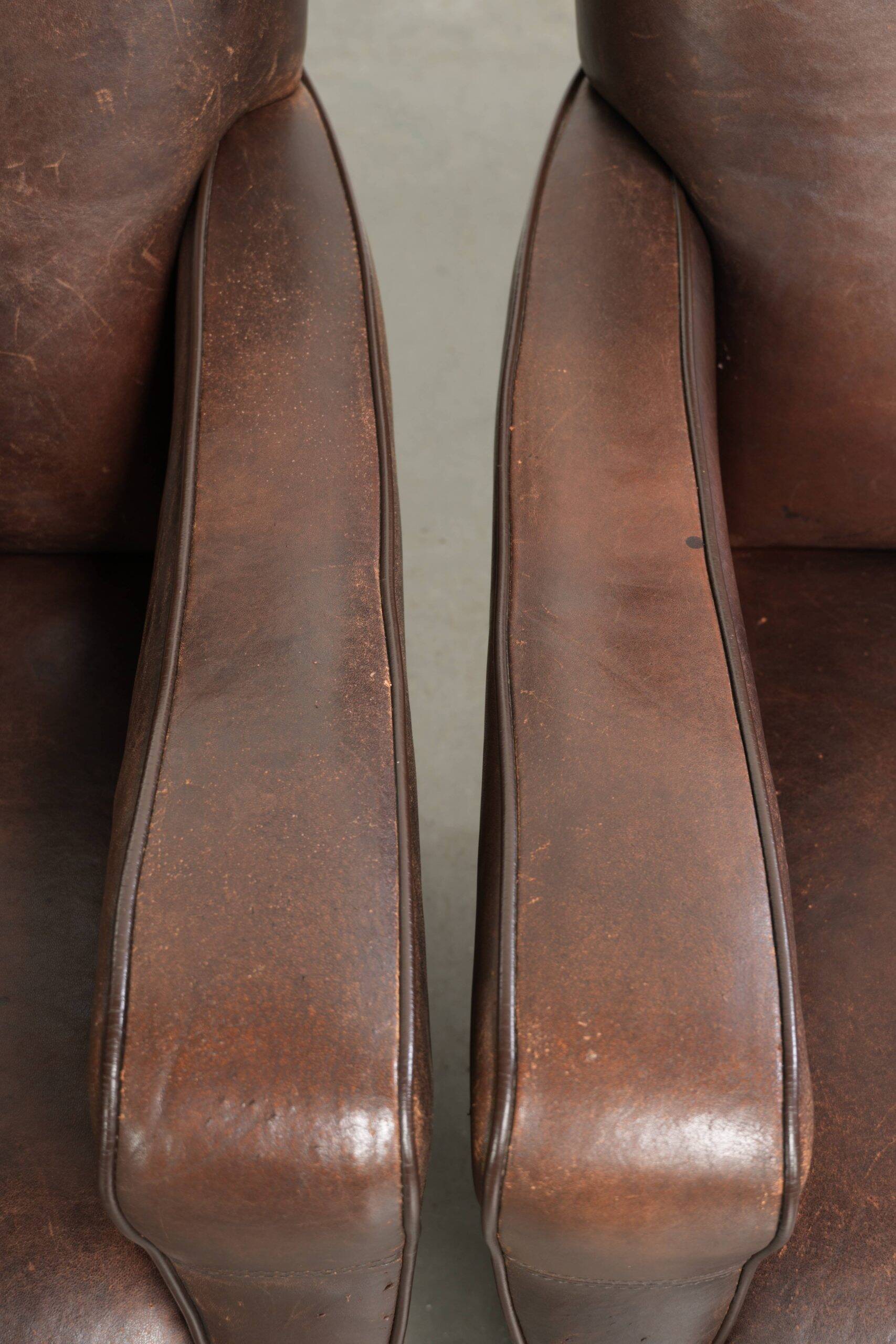 Sturdy set of vintage sheepskin armchairs with a nice English design