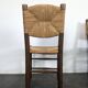 Série de 10 chaises modèle Bauche par Charlotte Perriand, circa 1960