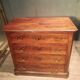 Small Louis Philippe chest of drawers with cut corners.
