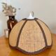 Suspension vintage en rotin formant une fleur