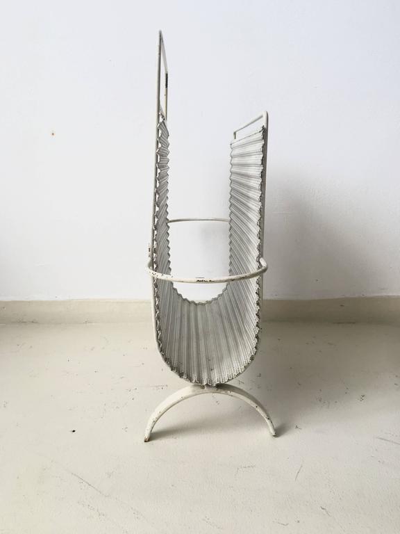 Modernist magazine rack by Mathieu Matégot to 1952