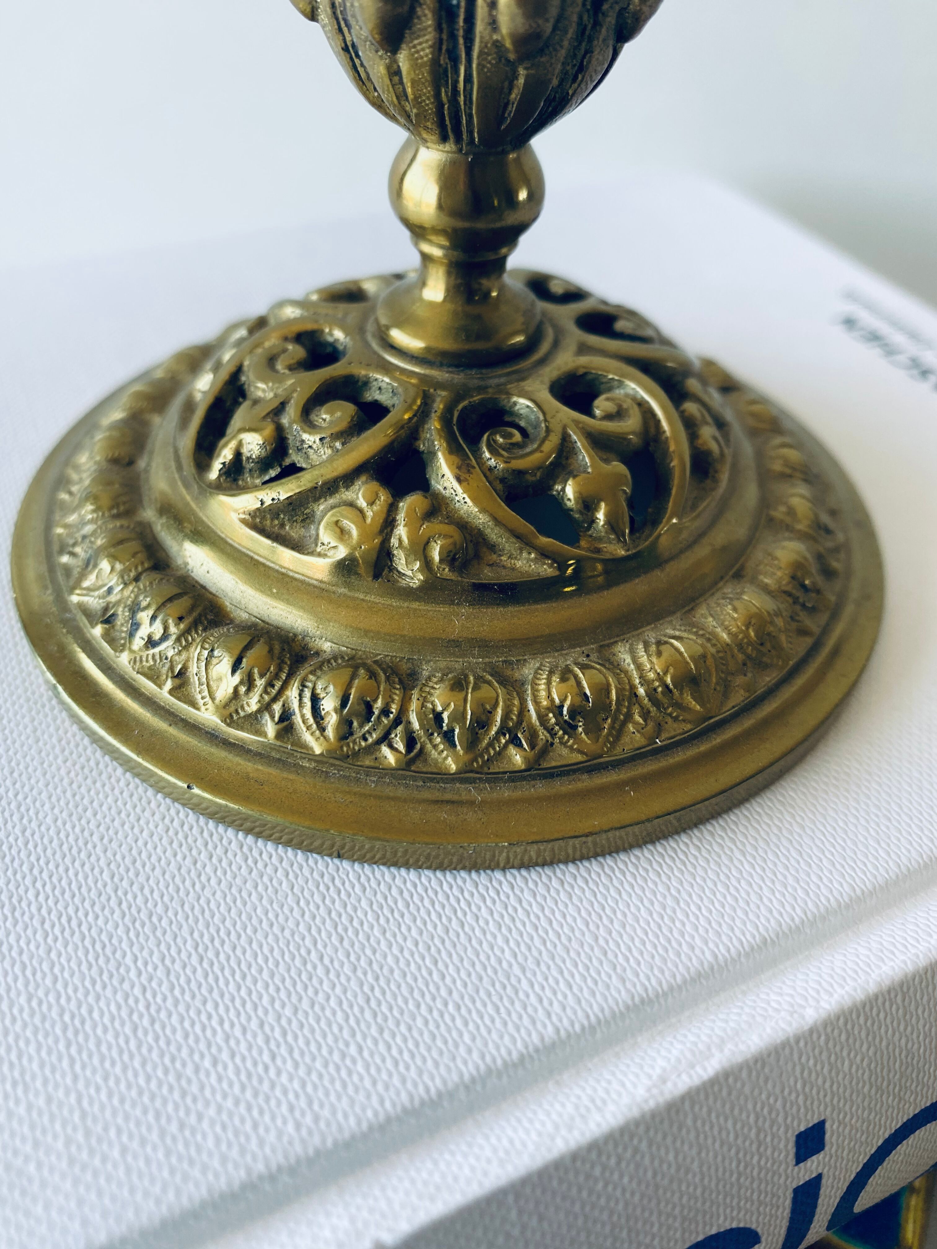 Pair of bronze candle holders signed