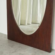 Miroir ovale facetté cadre rectangulaire chêne années 1920