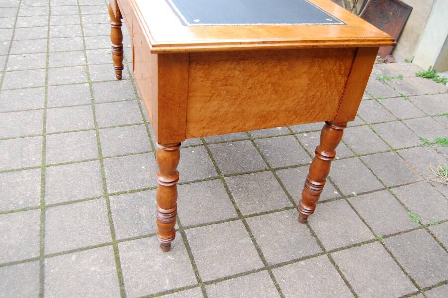 Louis Philippe period desk in mottled maple and cherry, 19th century.
