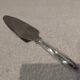 Christofle silver-plated metal cutting pie server with ribbons LXVI