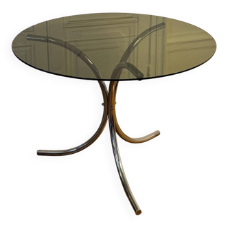 Round table in smoked glass and central stainless steel base
