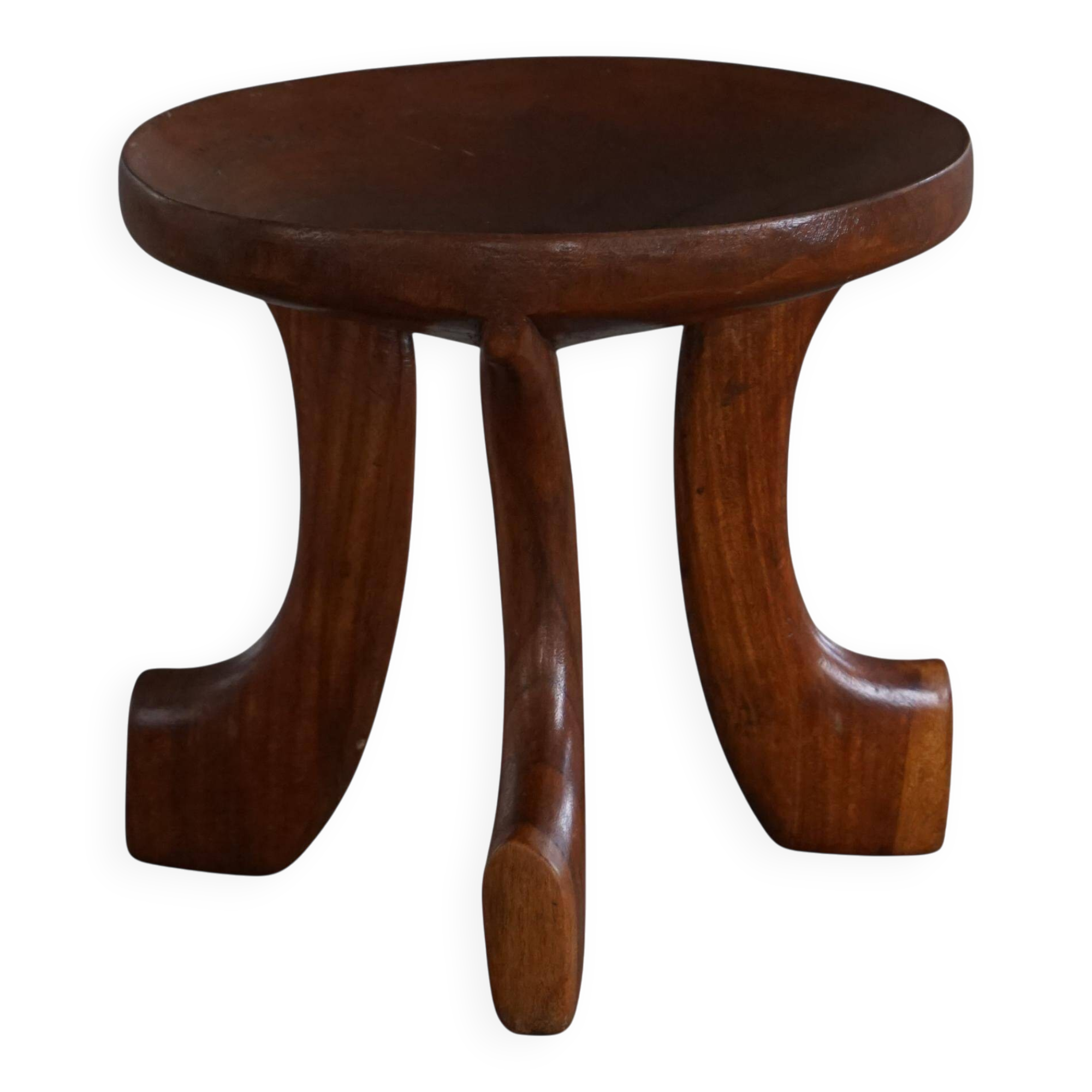 Oromo stool from mid-20th century Africa, hand-carved wood, tribal style.