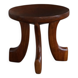 Oromo stool from mid-20th century Africa, hand-carved wood, tribal style.