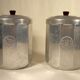 Two Art Deco aluminum pots 17 x 12 cm