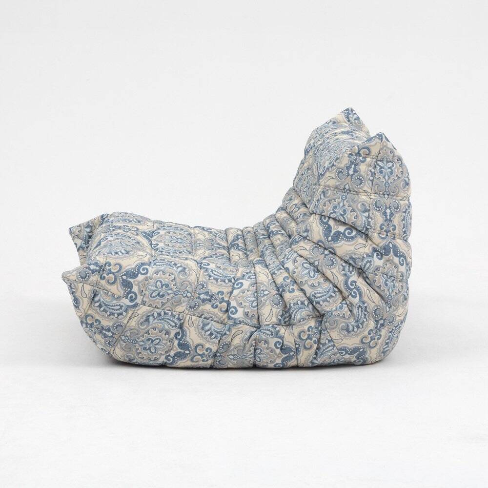 Togo lounge chair and pouf in patterned fabric by Michel Ducaroy for Ligne Roset, 1973, set of 2