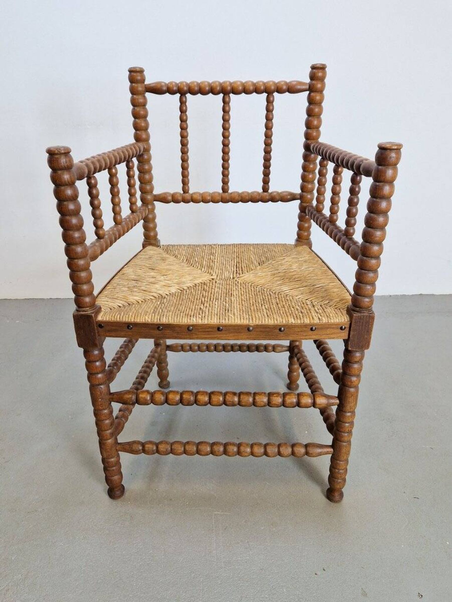 Mid-Century Arts and Craft Oak Bobbin Chair with Rush Seat, 1930s